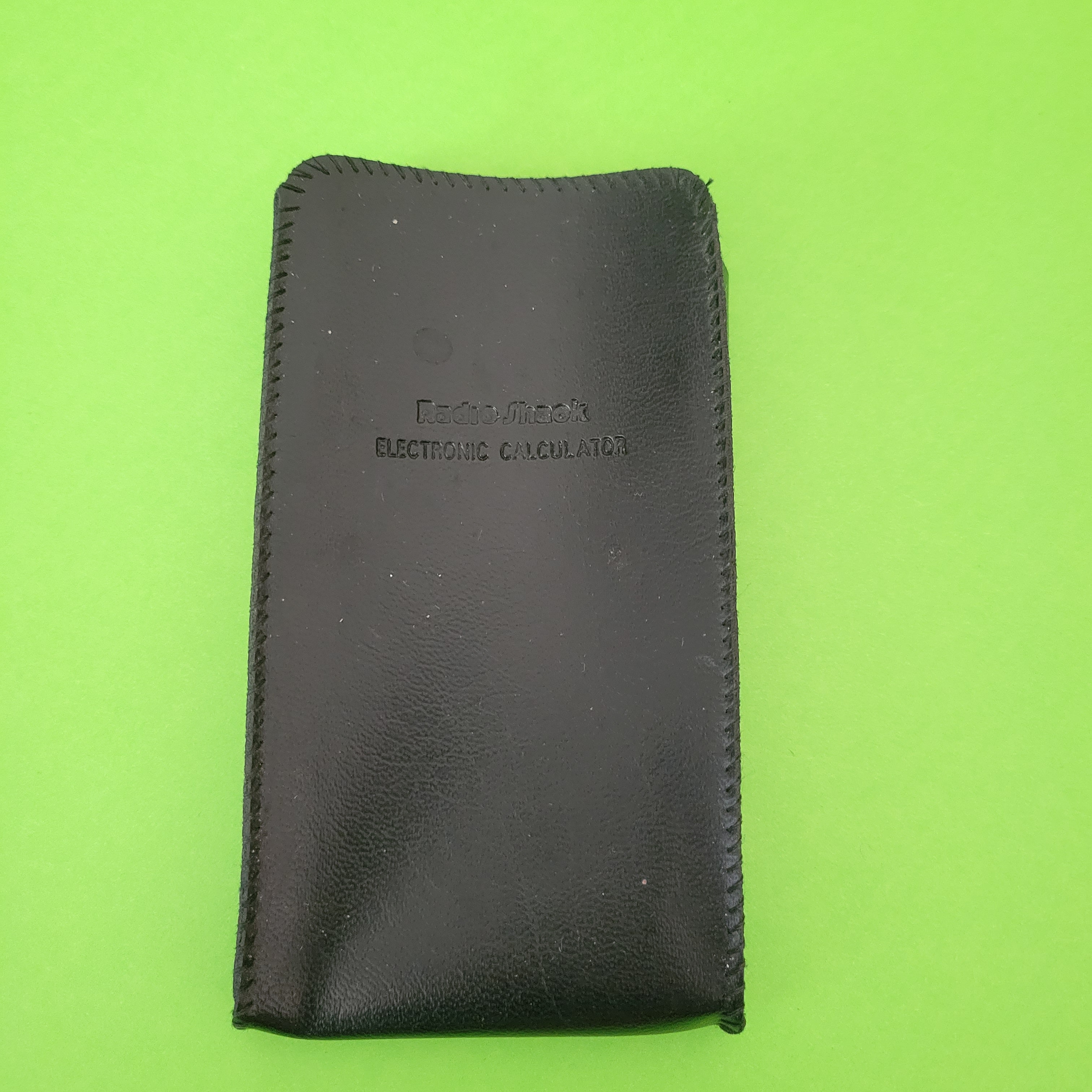 An image of the case of a Radio Shack EC-241 Four Function plus calculator